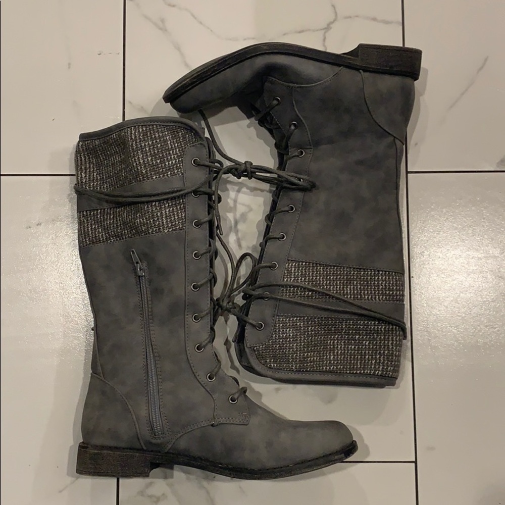 Calf high boots.